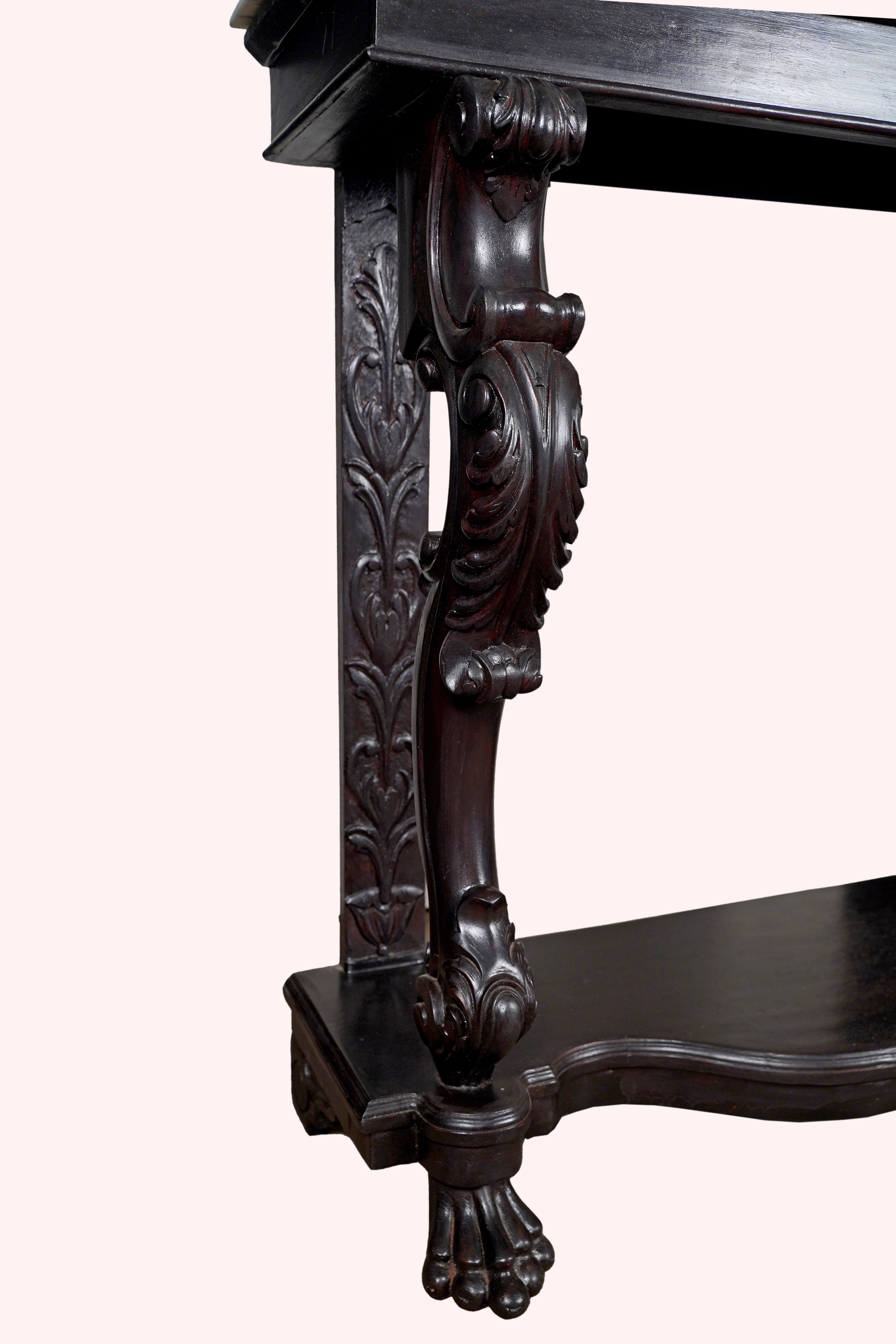 Side profile of carved wood and marble console table against pastel background – Aartaa Decor