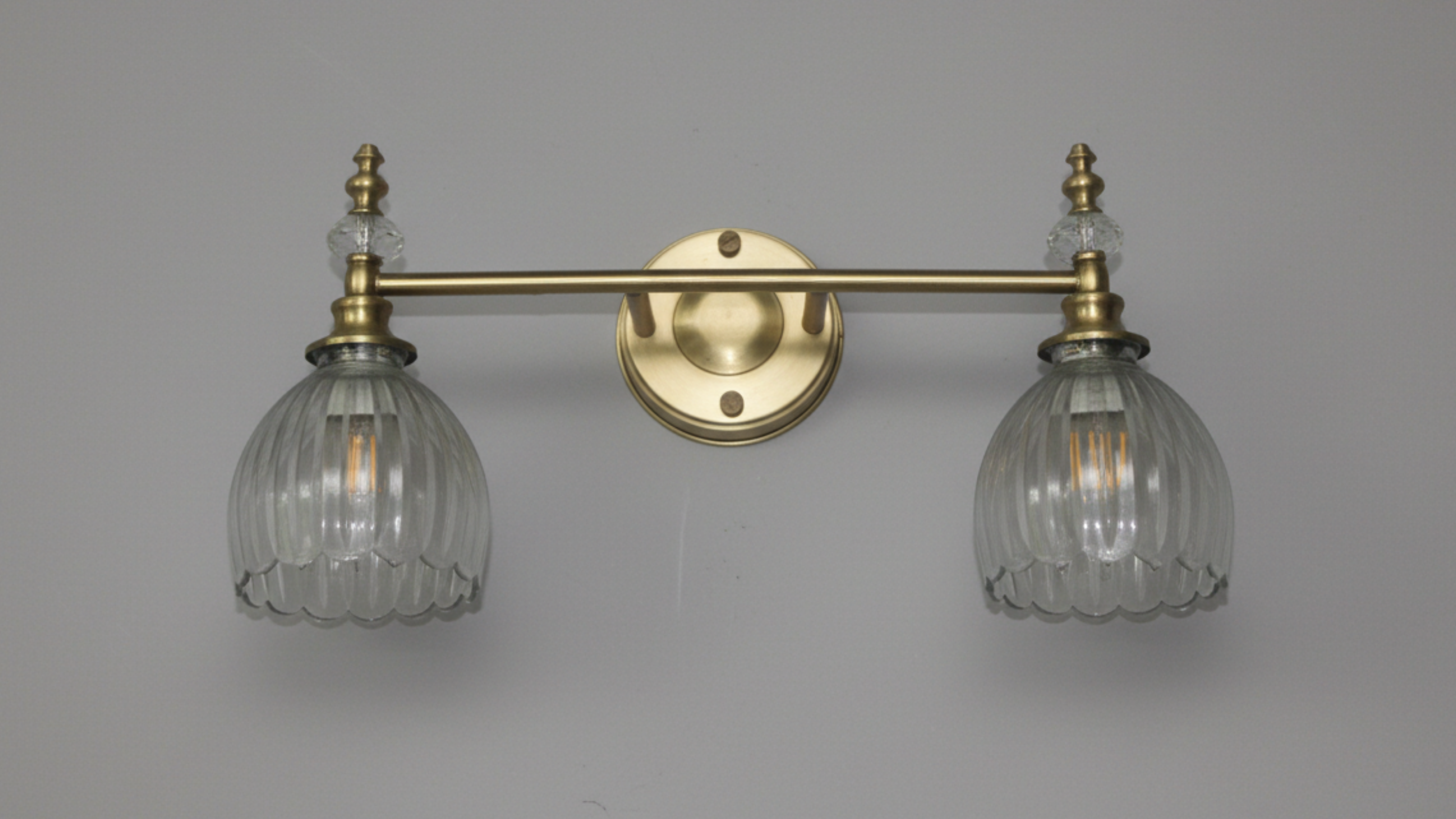 Crystal Crown Double Wall Light with ribbed glass shades and antique brass finish – luxury handcrafted wall lamp by Aartaa Decor