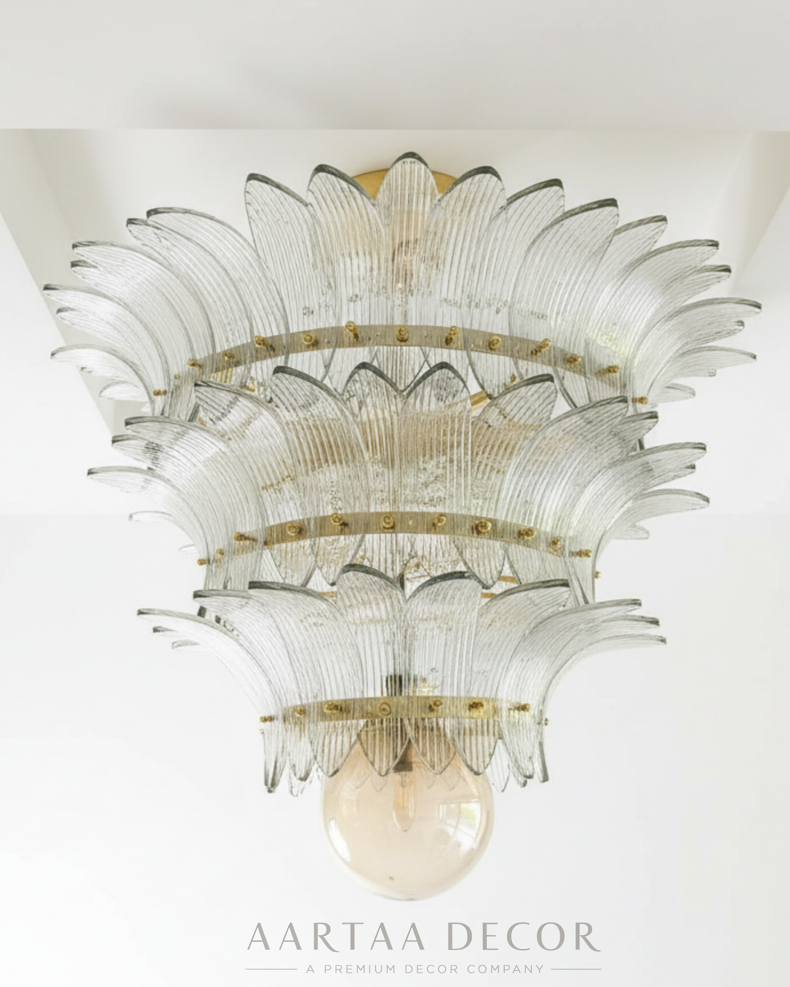 Decorative ceiling light fixture with glass and metal design, branded 'Aartaa Decor'.
