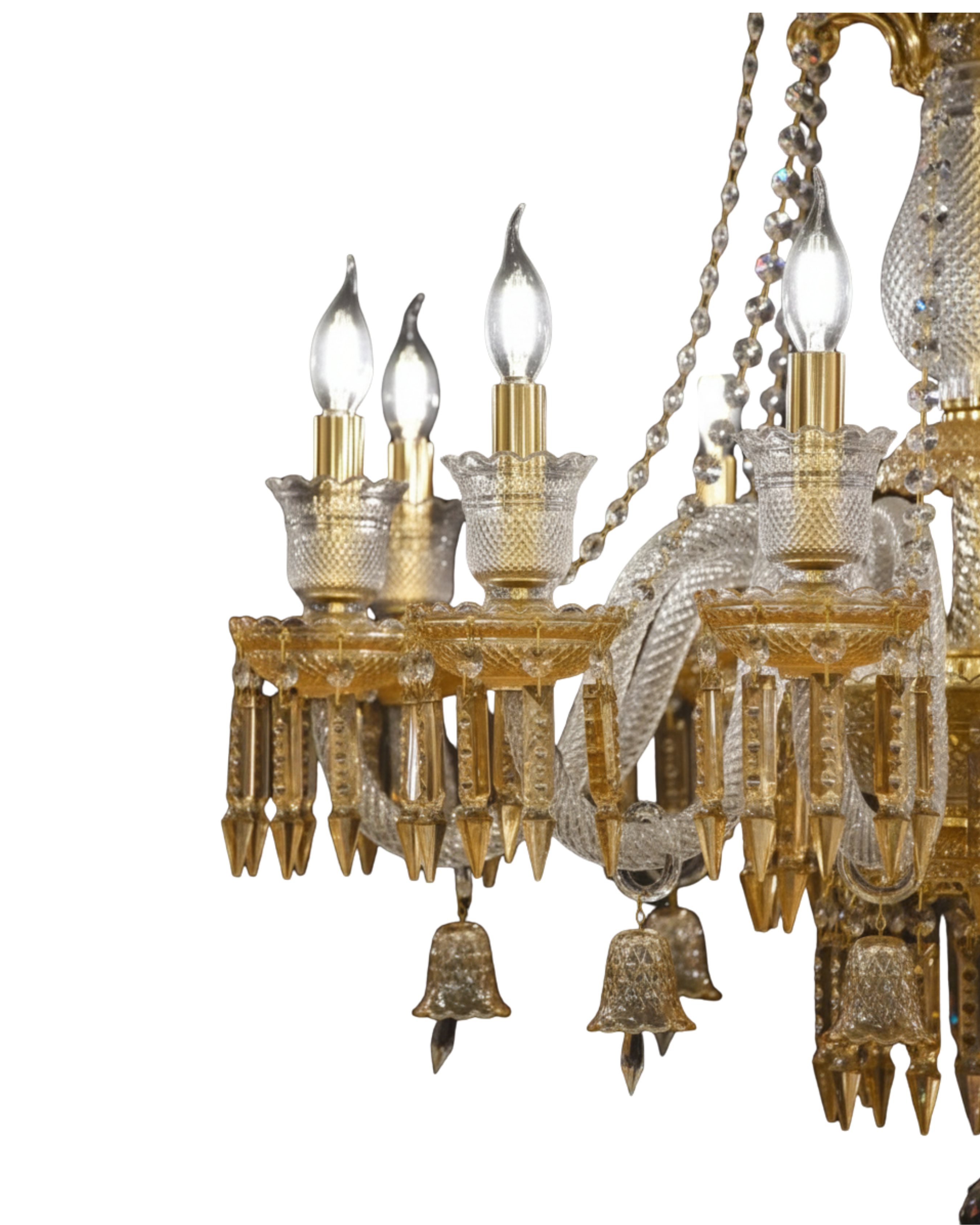 Decorative chandelier with gold and crystal elements on a white background
