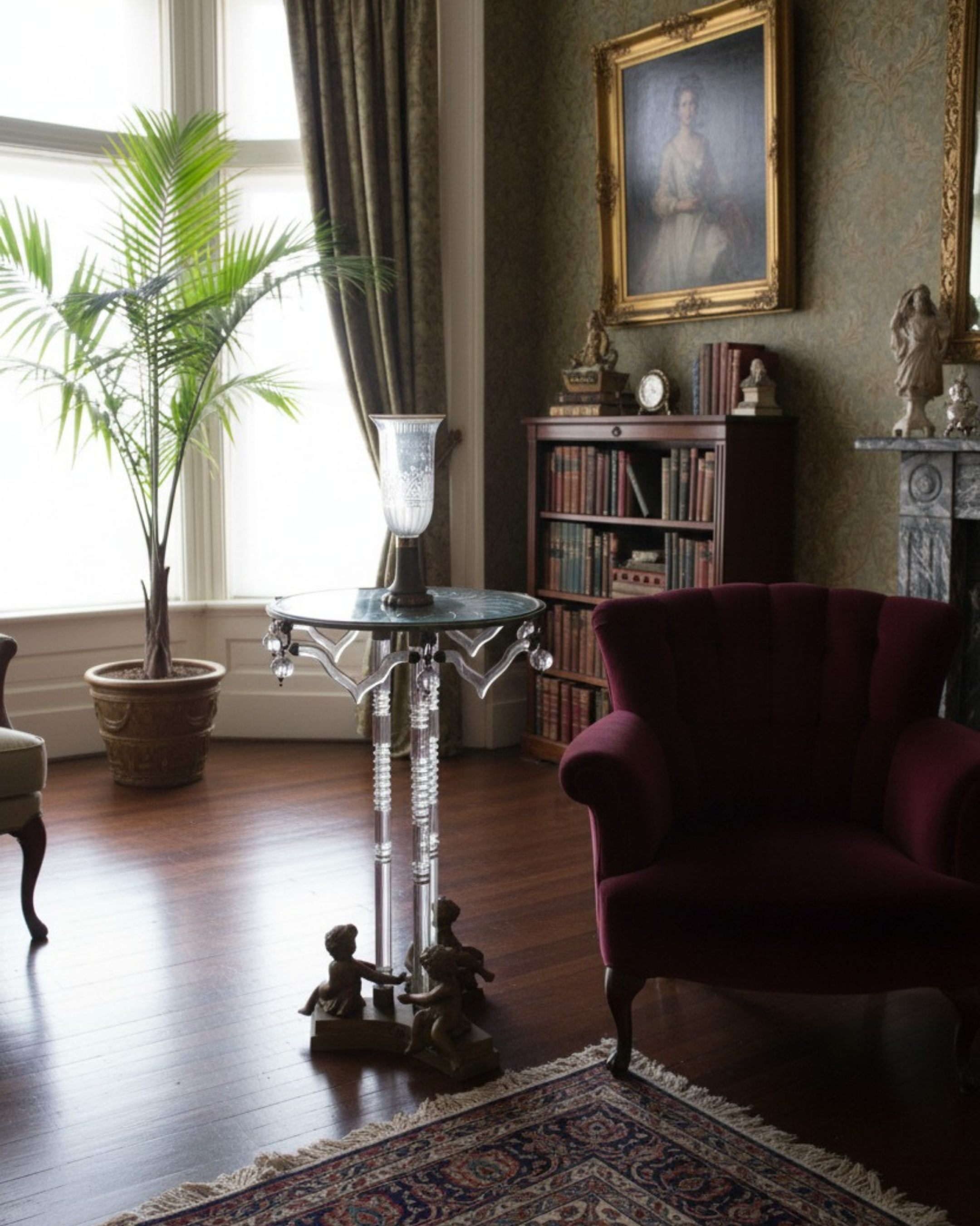 Cherub Crystal Pedestal Table styled in a luxury living room with vintage furniture – premium handcrafted crystal and brass accent table for elegant interiors.