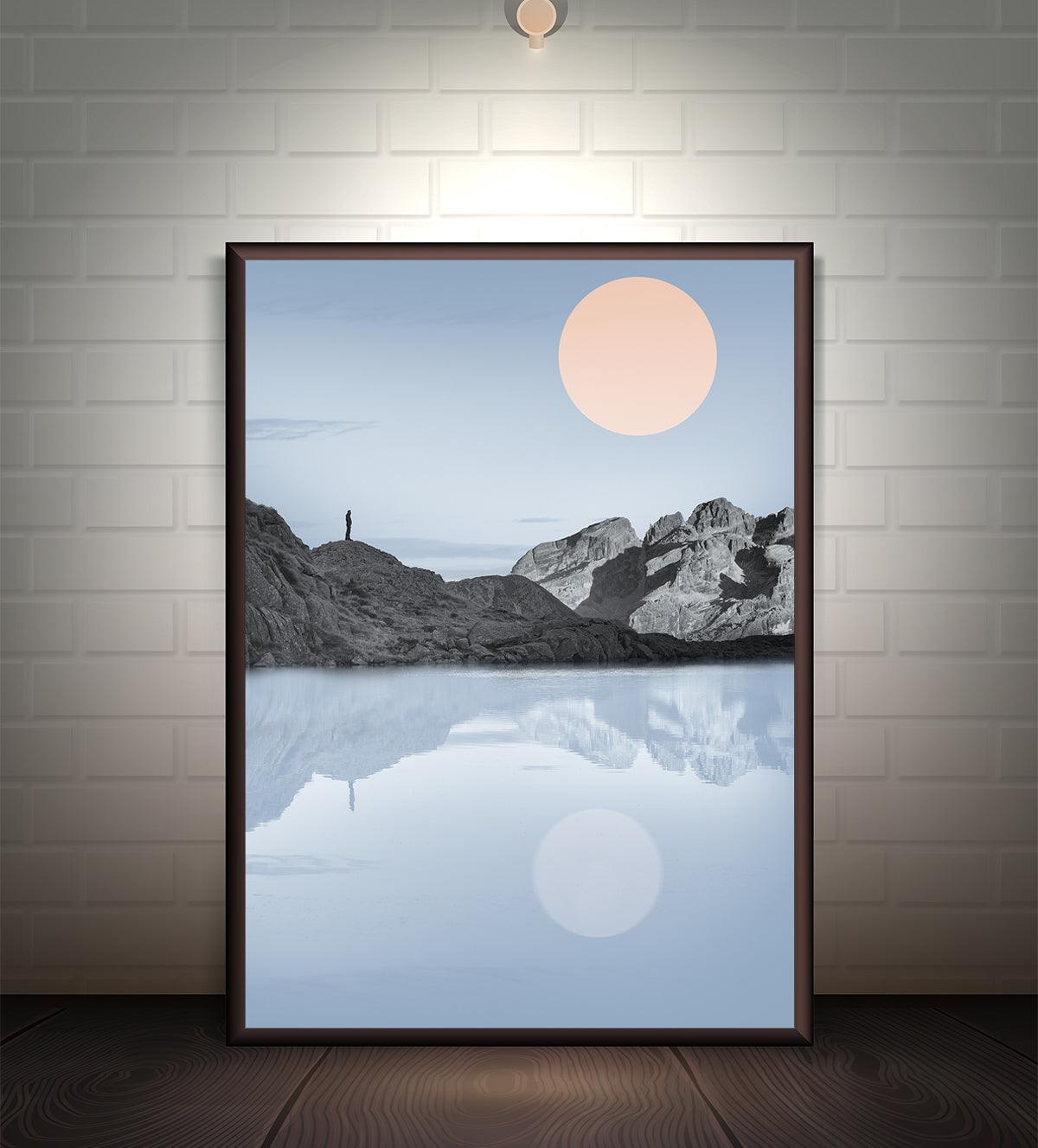 A calming wall art piece featuring a pastel sunrise over still waters, with mountains reflected in the lake. Ideal for creating a serene atmosphere in any space.