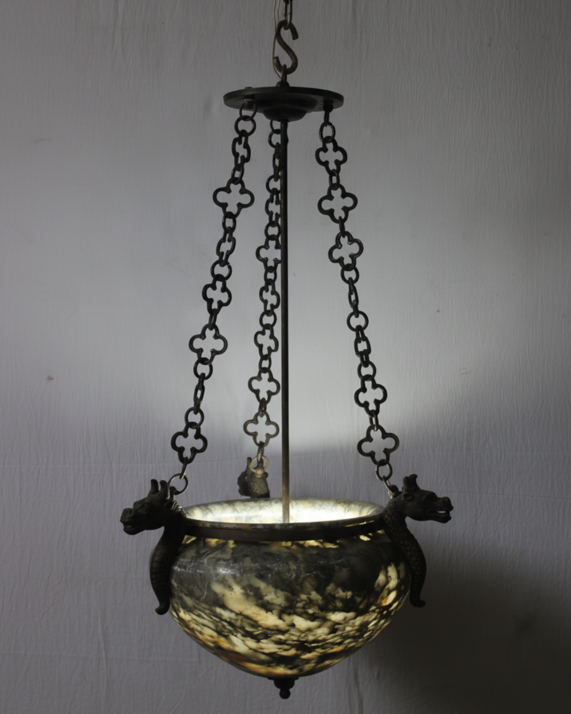 Luxury Dragon Crest Alabaster Pendant Light glowing with natural alabaster stone bowl and dragon accents, handcrafted in India by Aartaa Decor