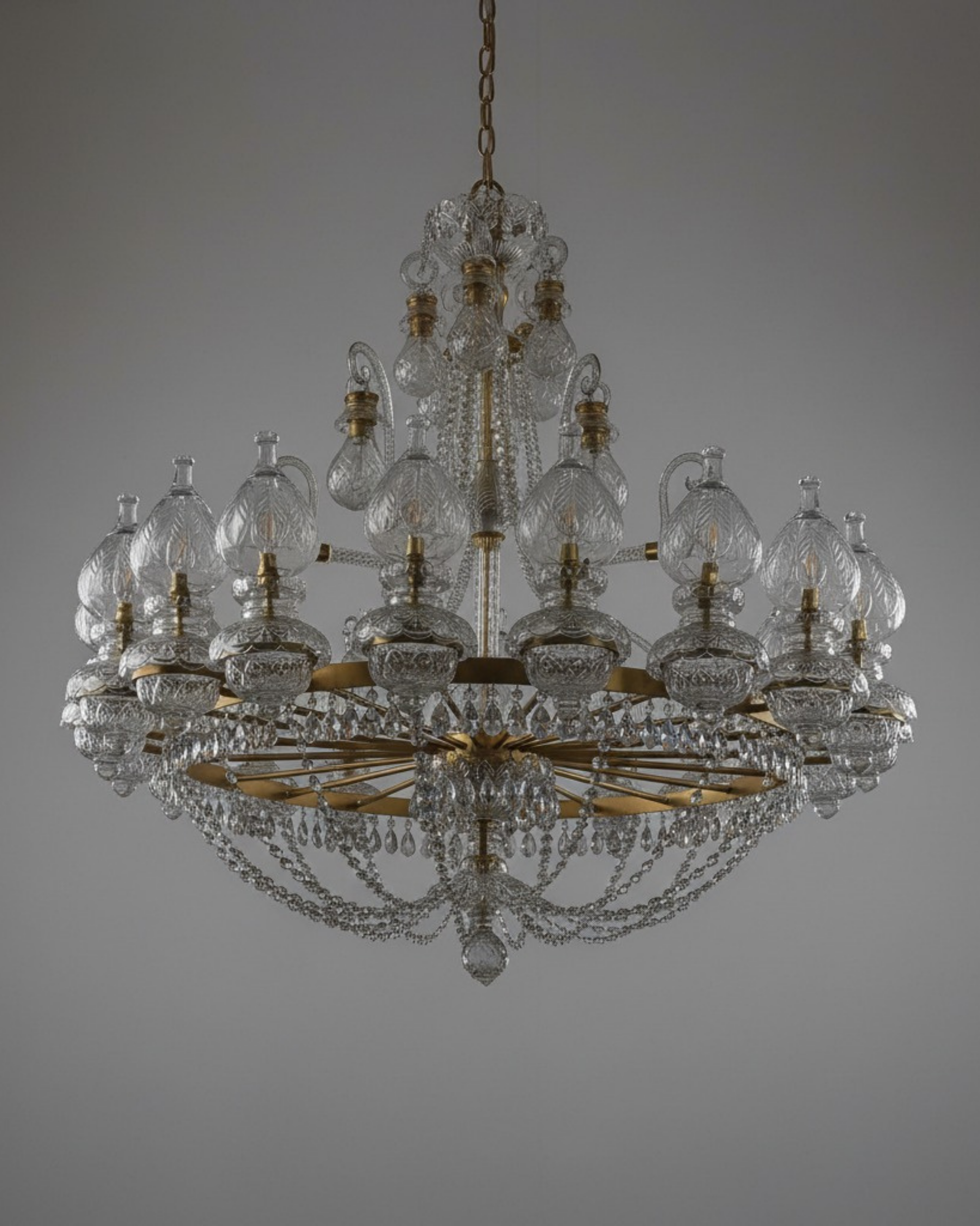 Elysian Flame 28-Light Grand Crystal Chandelier studio photo showing dual-tier brass frame and sparkling crystals.