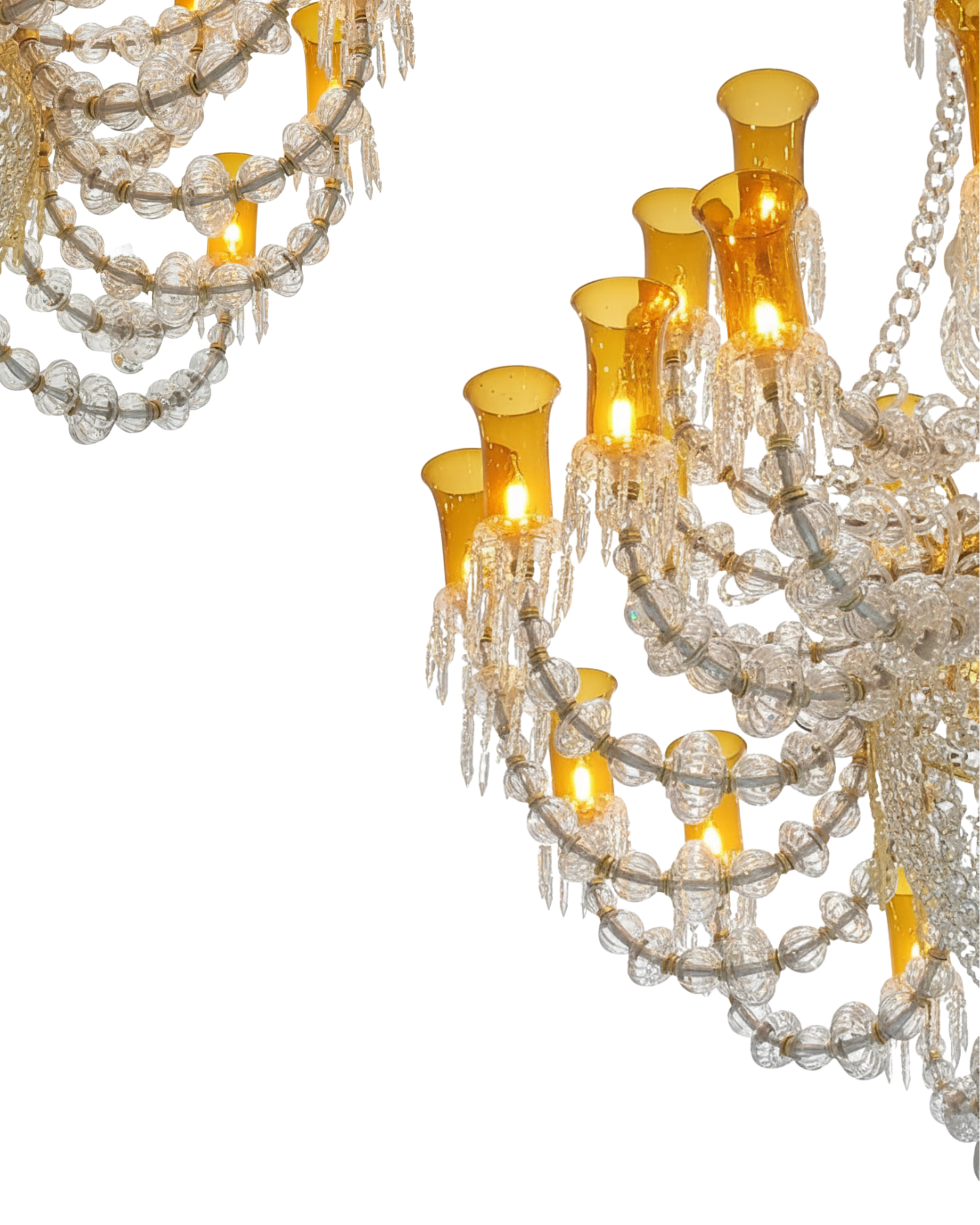 Decorative chandelier with crystal elements and yellow candle-like lights on a white background