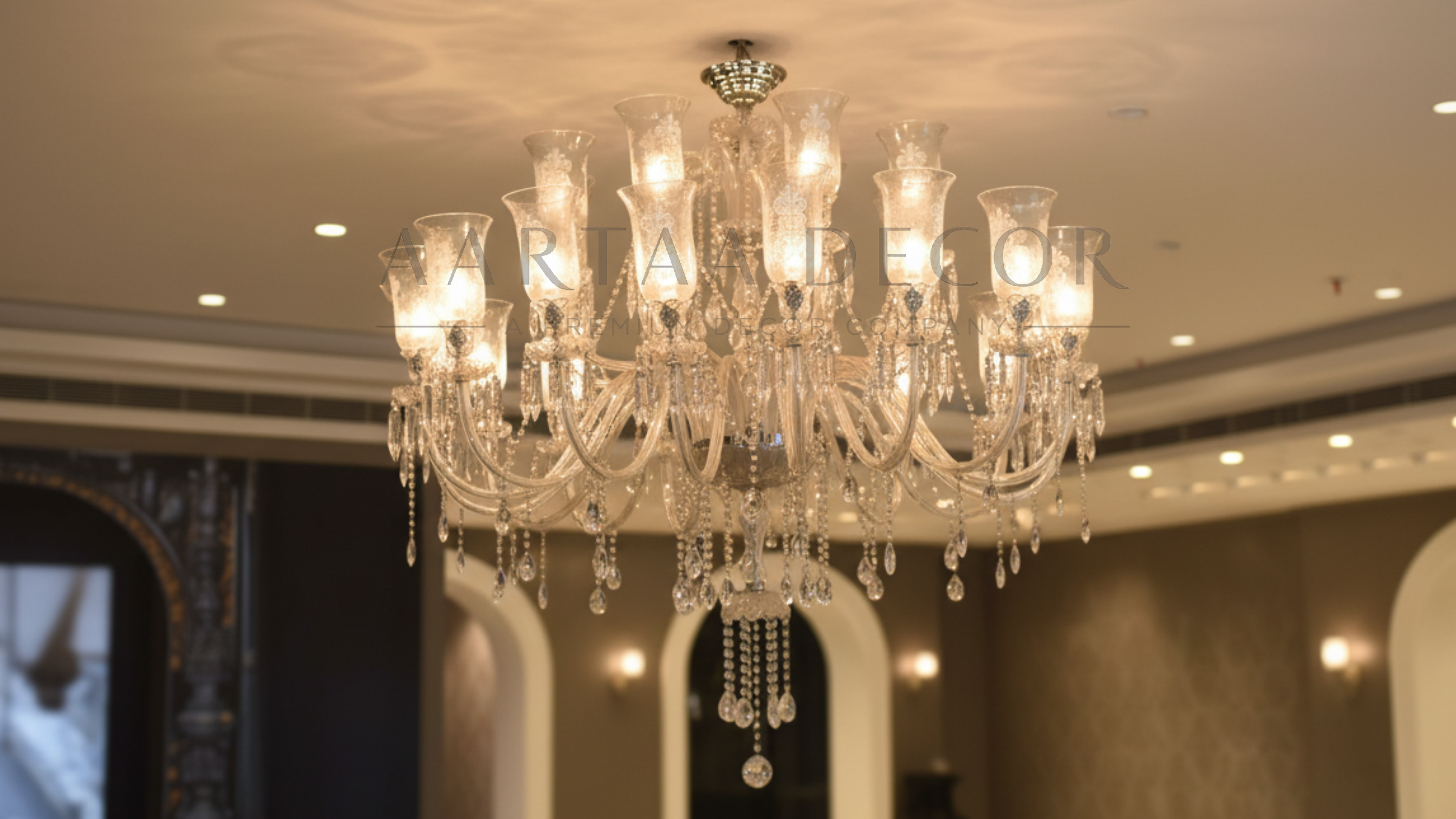Imperial Grandeur 24-light crystal chandelier — handcrafted in India with etched glass shades and cascading crystal drops.