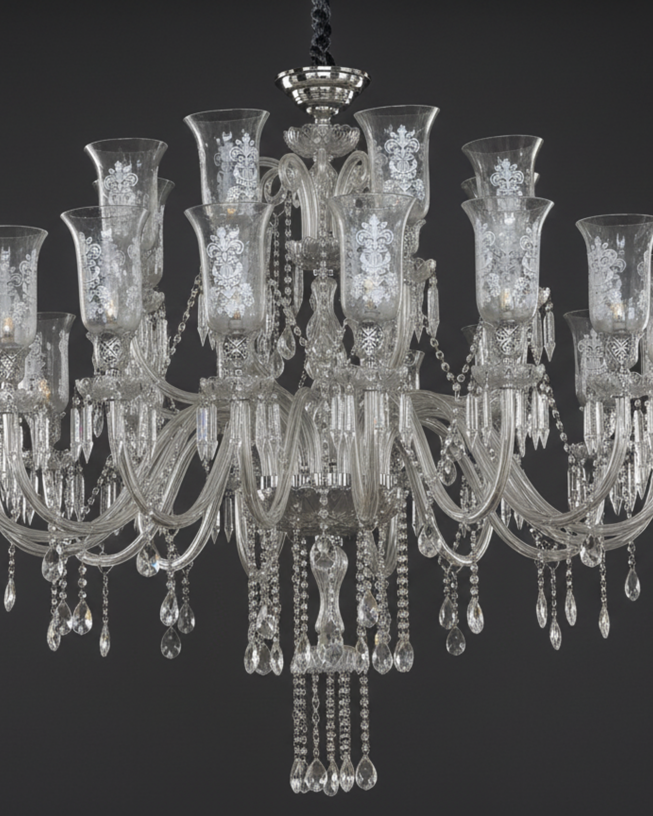 Crystal chandelier with intricate design on a black background
