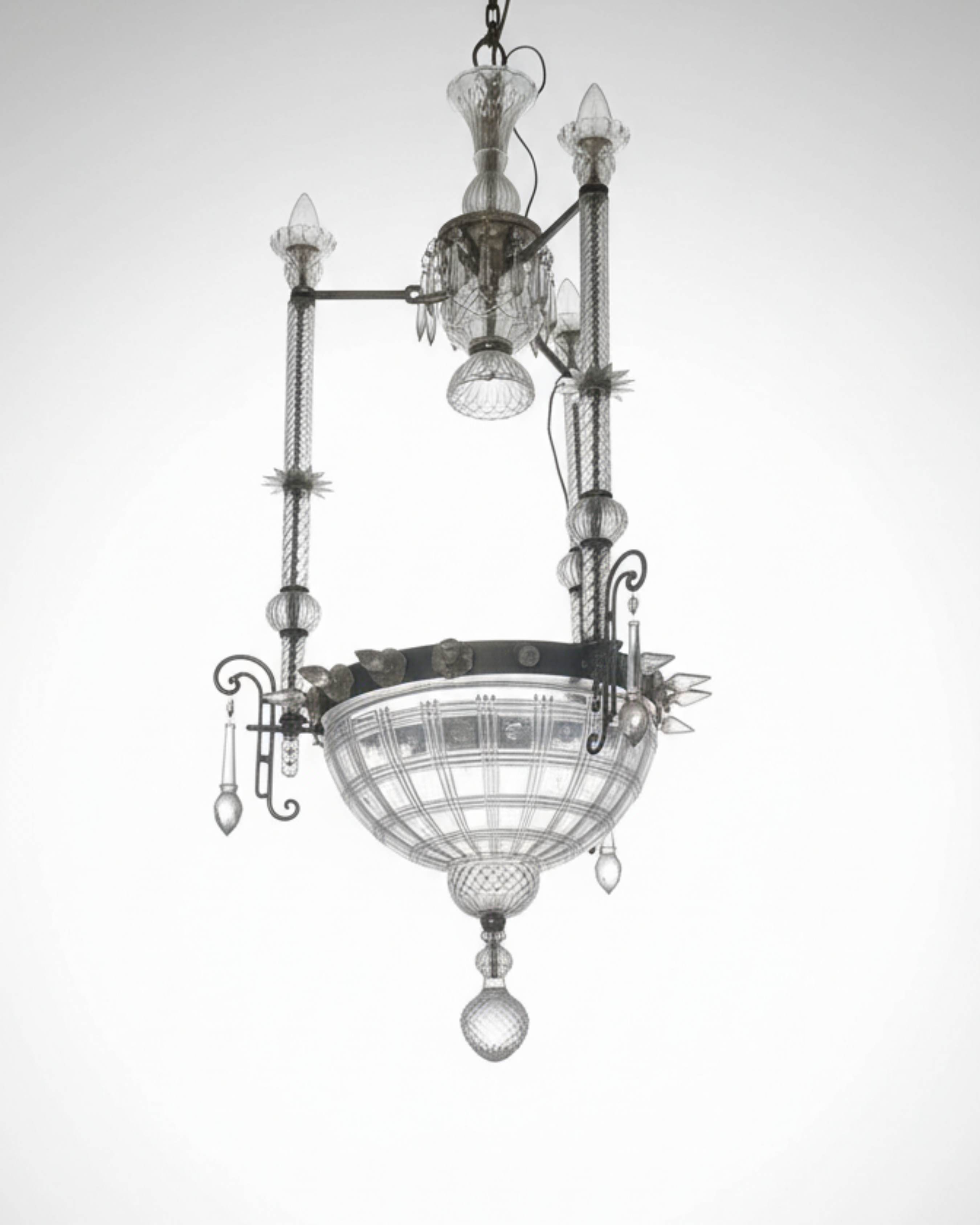 Decorative chandelier with intricate design on a white background