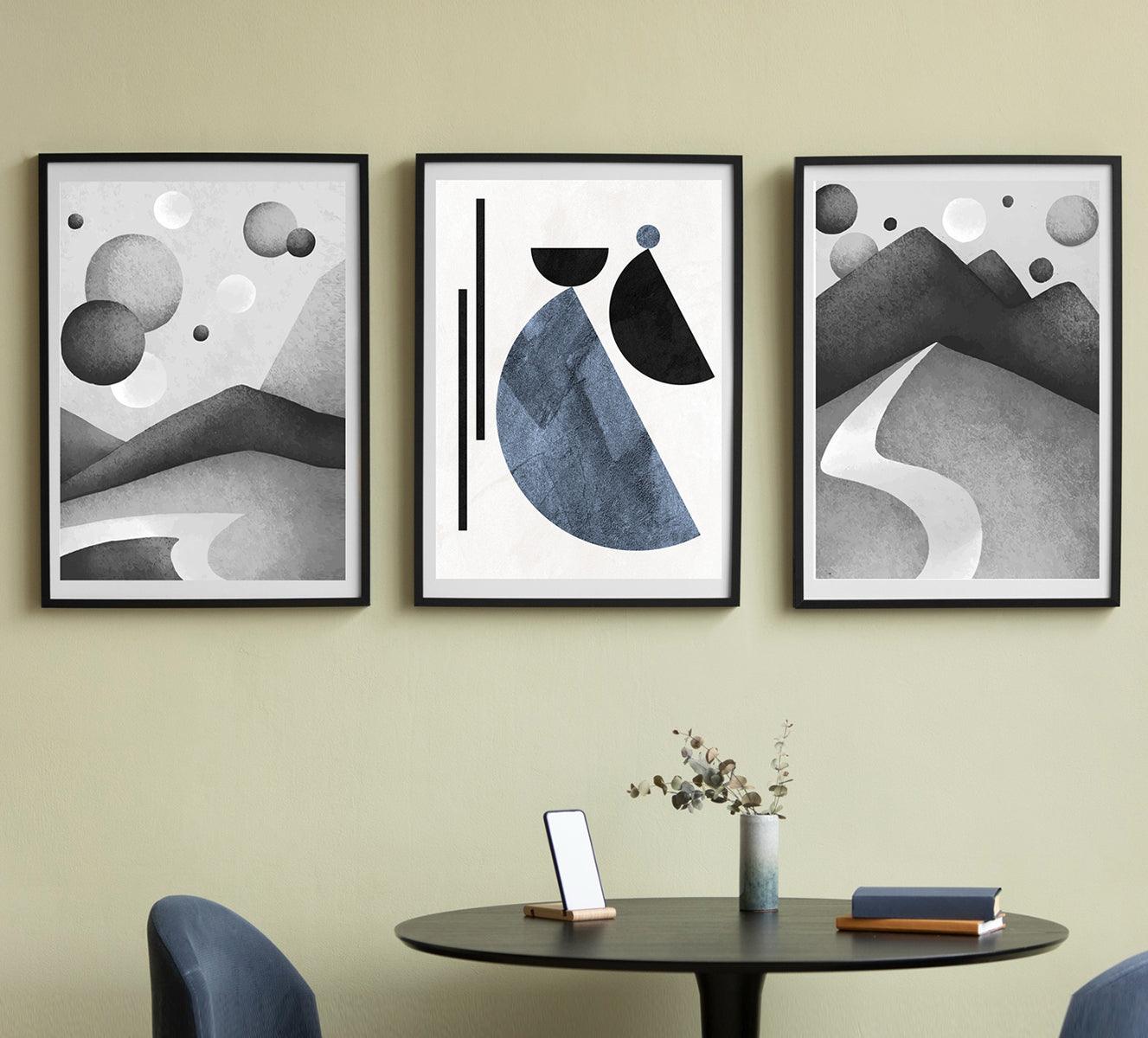 Set of three black-and-white abstract art prints with minimalist geometric shapes, ideal for adding a calming and sophisticated touch to modern interiors.