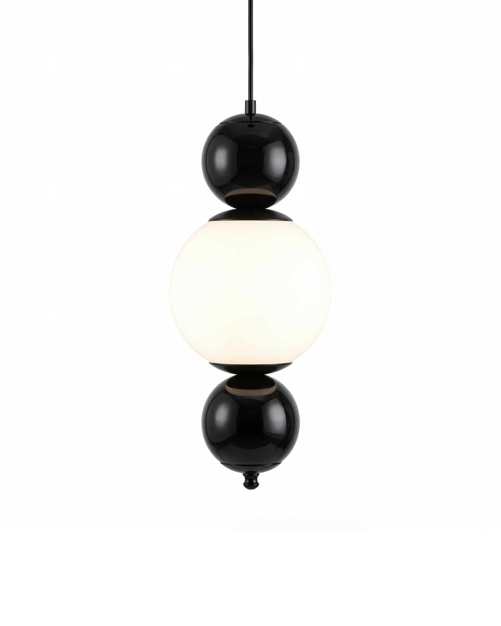 Modern pendant light with black and white spherical design on a white the Noor Orb Pendant Light is a statement of understated luxury. The design features a luminous handcrafted glass sphere, framed gracefully by solid brass accents that add warmth, contrast, and durability. background