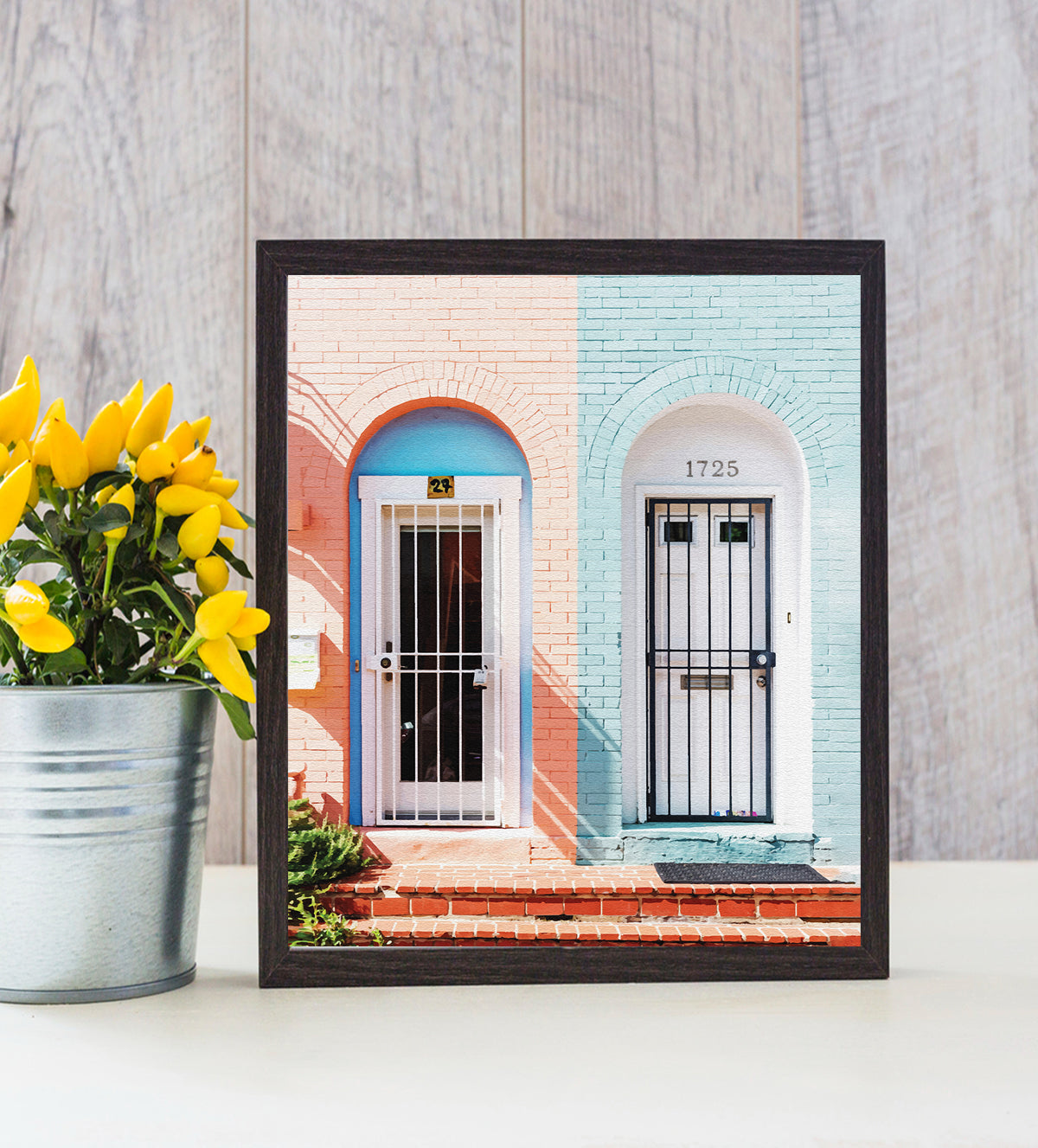 Urban Doors: Pop Culture Contrast in Pink & Blue." This eye-catching art piece showcases the charm of city streets, featuring a stunning door duo in bold pink and serene blue. The two-tone doors create a striking visual contrast, instantly energizing any room with a playful yet sophisticated aesthetic.
Striking pink and soft blue doors bring urban architecture to life
Metal hardware and address numbers add a touch of authenticity
High-quality canvas print with crisp photographic detail