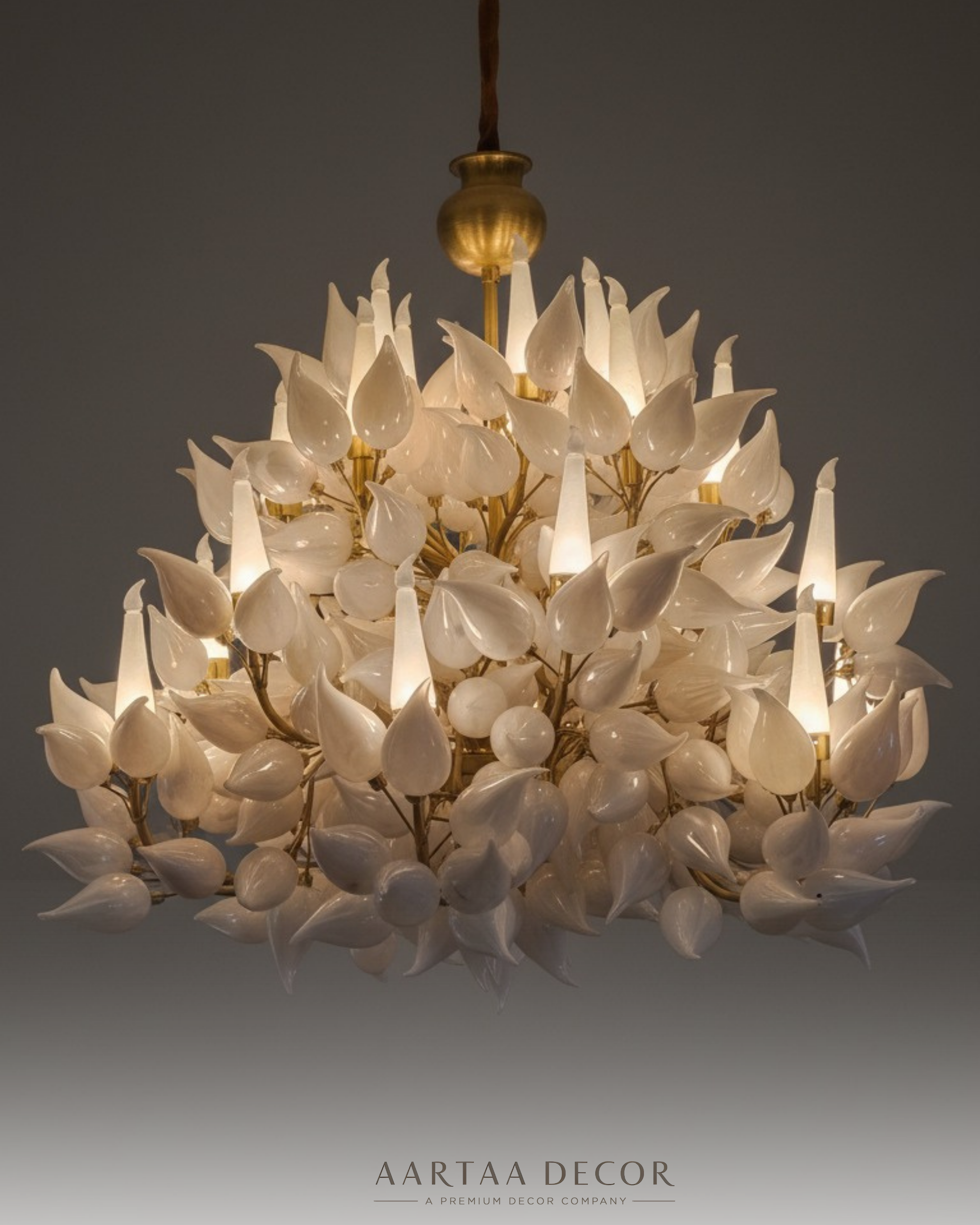 Close-up of the Radiant Petal Cascade Chandelier showcasing handcrafted glass petals and gold brass frame. shoot