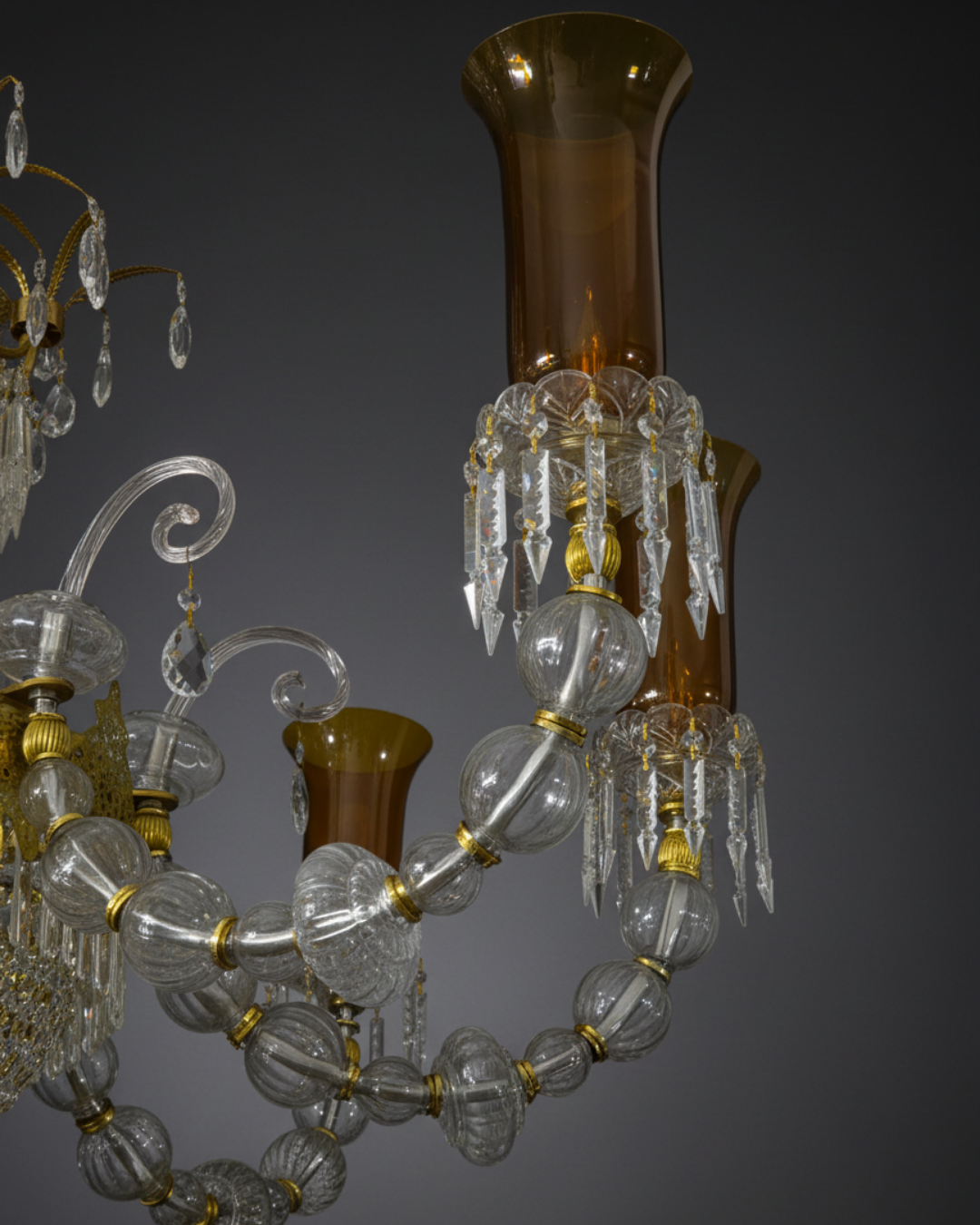 Regalia Grand Crystal Chandelier installed in a heritage temple interior, creating a warm regal glow and enhancing the traditional architecture. Close up