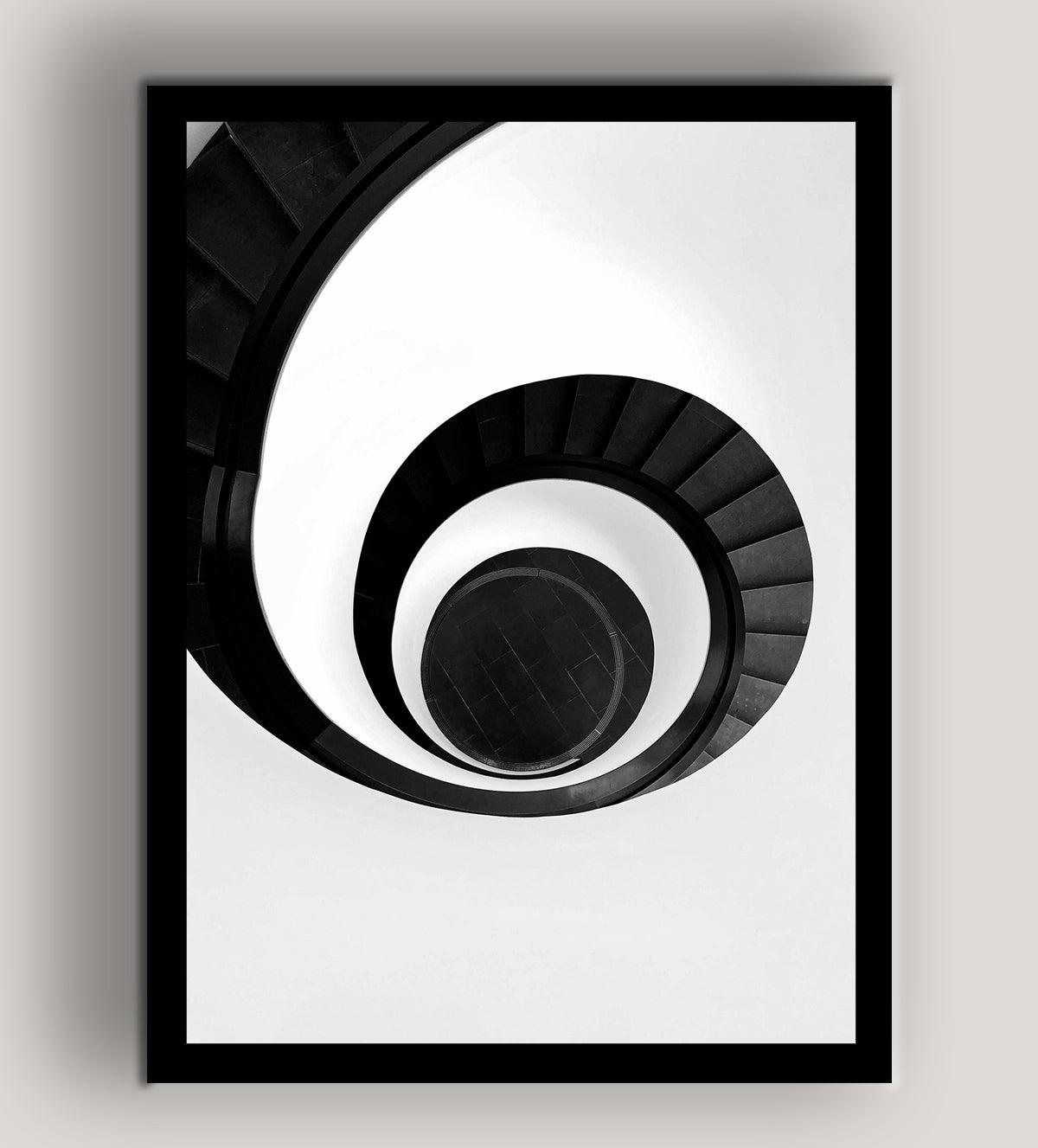 Add a touch of sophistication to your living space with "The Infinite Spiral", a striking black-and-white photograph featuring an elegant spiral staircase. This visually stunning art piece creates a sense of movement and depth, drawing the viewer's eye into the seemingly endless loop of the staircase’s curves. Its minimalist aesthetic seamlessly complements any modern or contemporary décor, making it an ideal focal point for your home or office.