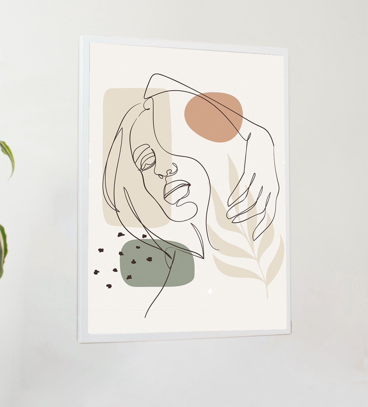 Minimalist line art of a woman’s face with abstract earthy shapes, in a calming and introspective pose, displayed in a framed artwork against a softly lit background. - Aartaa decor