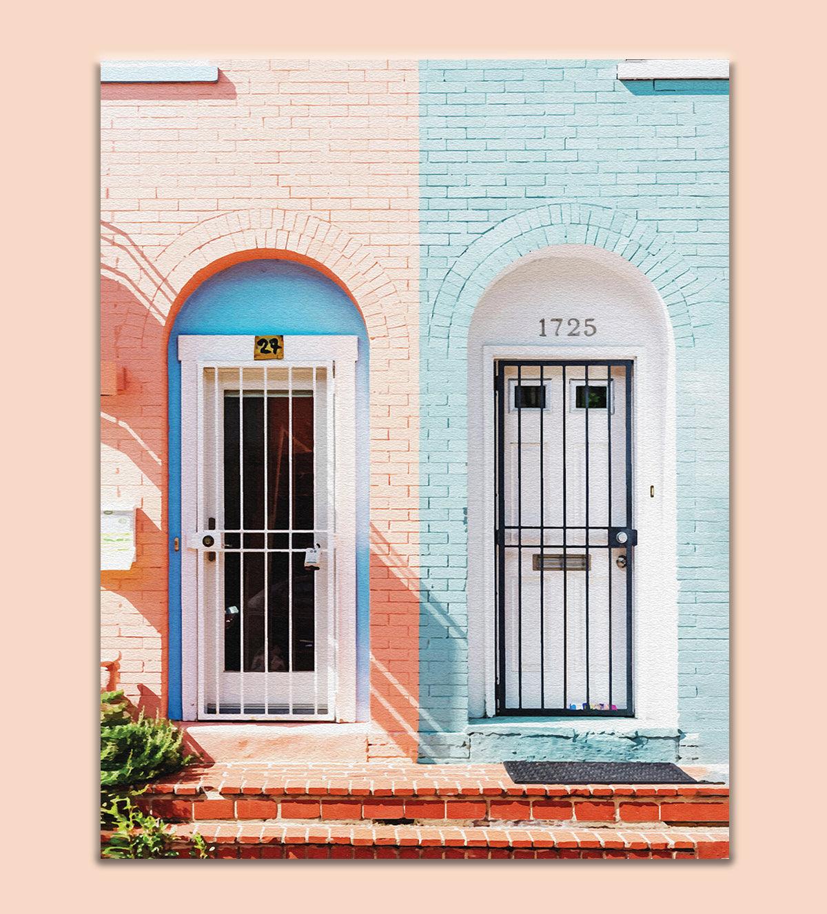 Urban Doors: Pop Culture Contrast in Pink &amp; Blue." This eye-catching art piece showcases the charm of city streets, featuring a stunning door duo in bold pink and serene blue. The two-tone doors create a striking visual contrast, instantly energizing any room with a playful yet sophisticated aesthetic