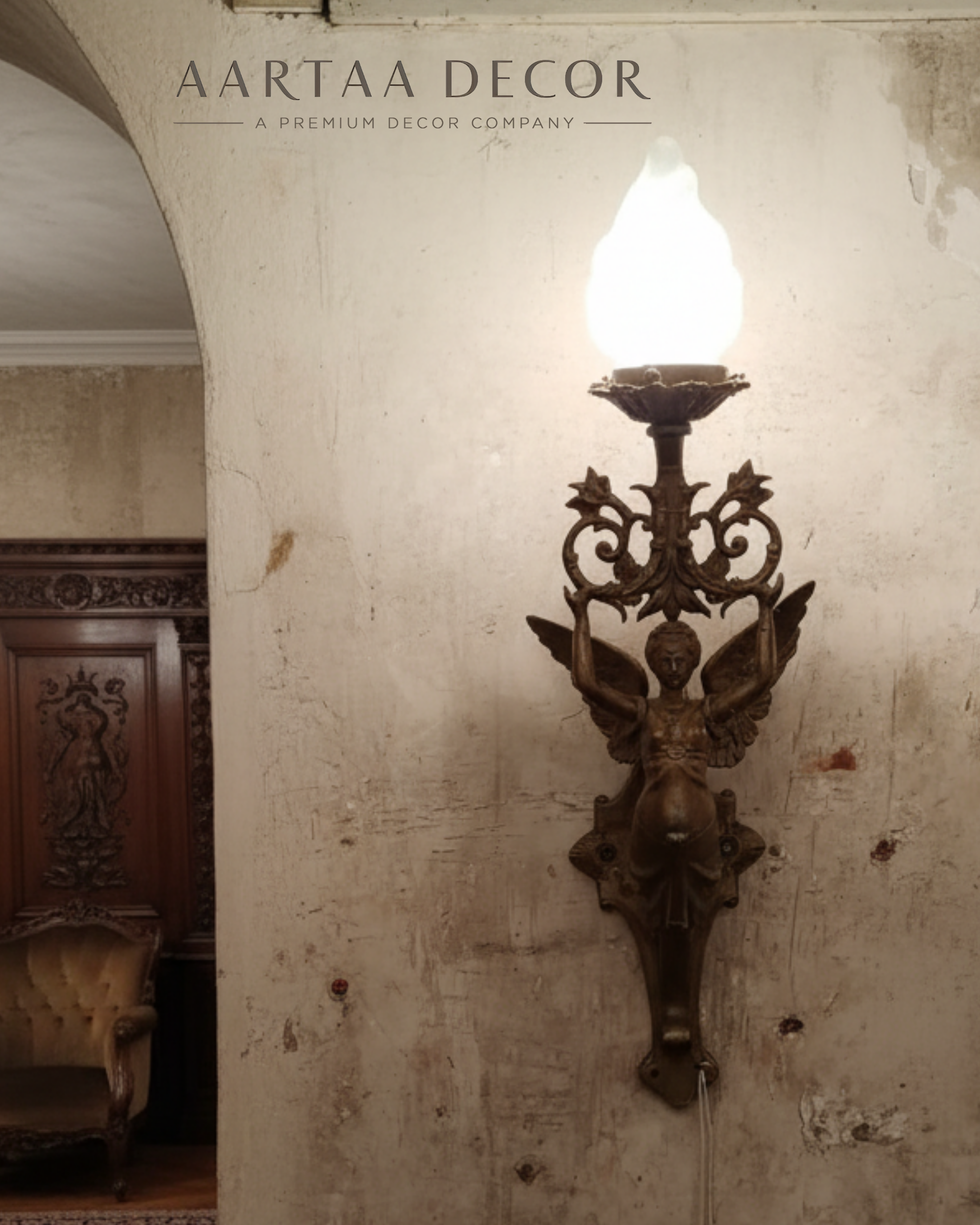 Decorative wall sconce on a textured wall with 'Aartaa Decor' branding.