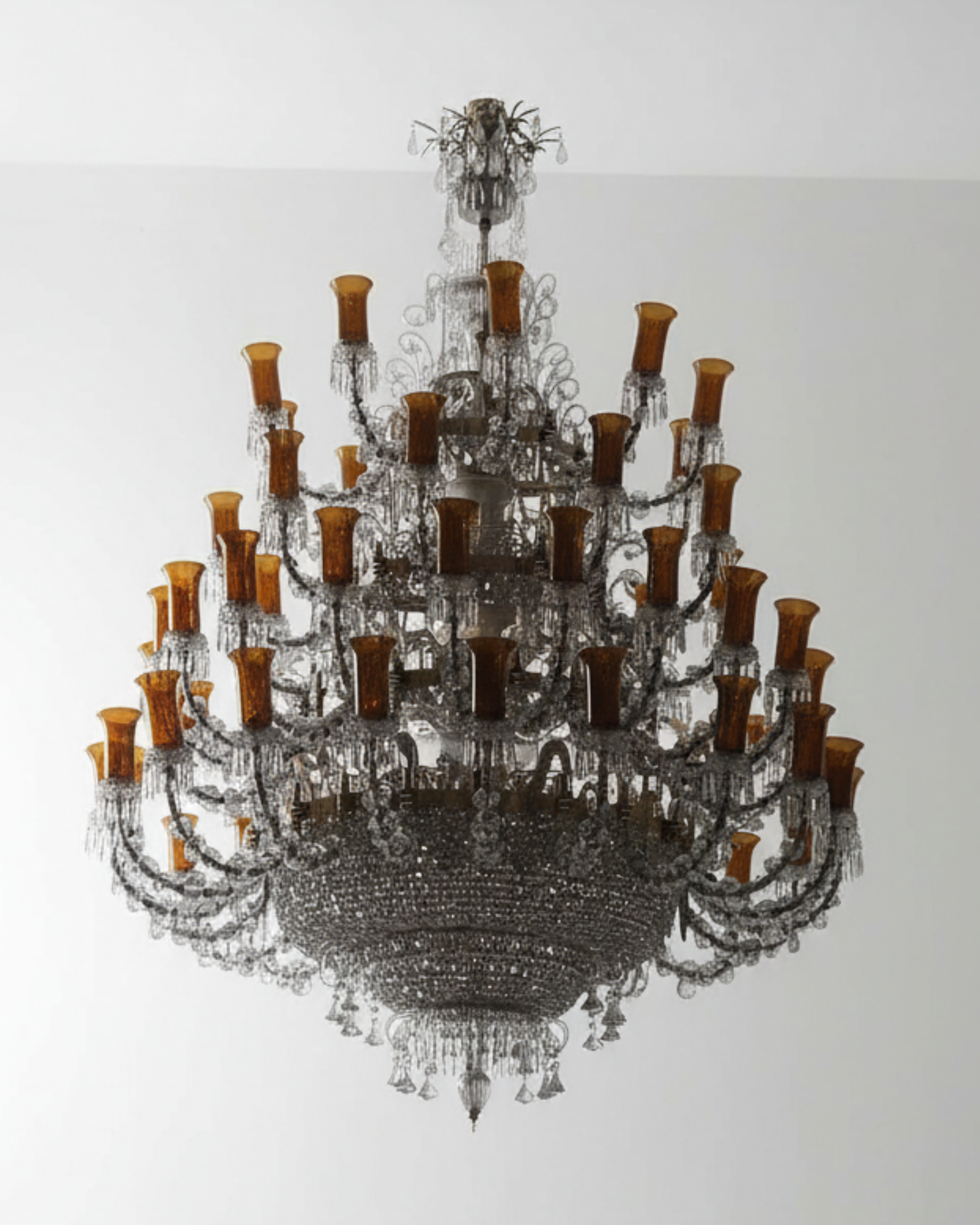 Decorative chandelier with multiple arms and candle-like fixtures on a white background