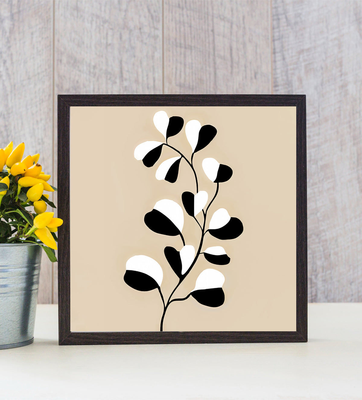 Timeless Botanical Elegance brings the natural beauty of the outdoors into your home with this stunning black and white botanical art print. Its clean, minimalist design captures the intricate details of leaves and branches, symbolizing the eternal beauty of nature. The contrasting tones of deep black against a soft white backdrop evoke a sense of sophistication, making it an ideal choice for modern, minimalist, and traditional interiors alike - Aartaa decor